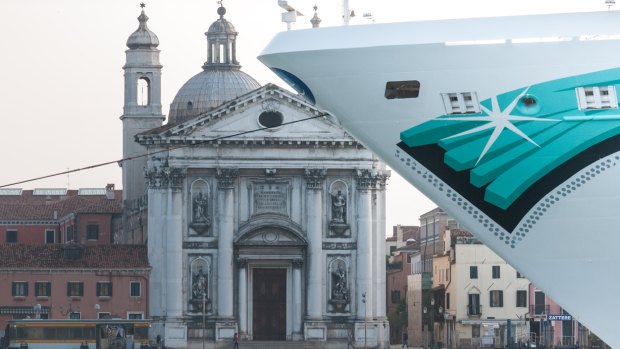 A cruise ship stopped at the Giudecca Channel in Venice.