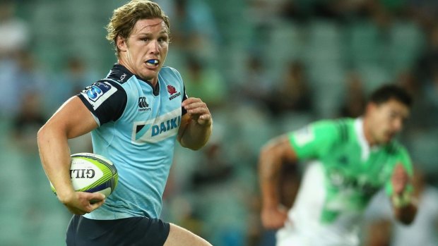 Michael Hooper makes a break during the Waratahs' loss to the Highlanders. 