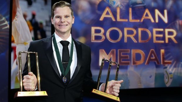 Big win: Steve Smith with the Allan Border Medal and the Test and ODI player of the year awards.