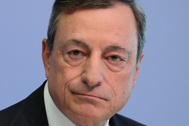 Mario Draghi signals very slow phase out for bond buying