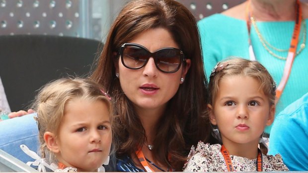 Myla Rose and Charlene Riva with mother Mirka Federer watch as father Roger plays an earlier tournament.
