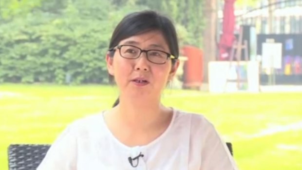 Human rights lawyer Wang Yu being interviewed on Hong Kong-based Phoenix TV after her release on bail. 