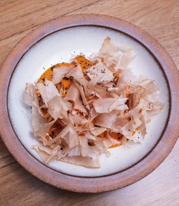 Crispy rice with red pepper butter and katsuobushi.