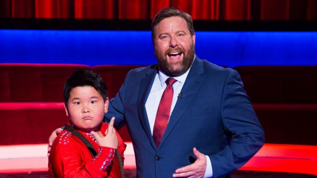 Little Big Shots host Shane Jacobson with Xiongfei. 