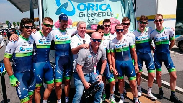 Team owner Gerry Ryan in the centre, flanked by cyclists with cinematographer Dan Jones at the front holding camera. Photo supplied by Orica-Scott .
