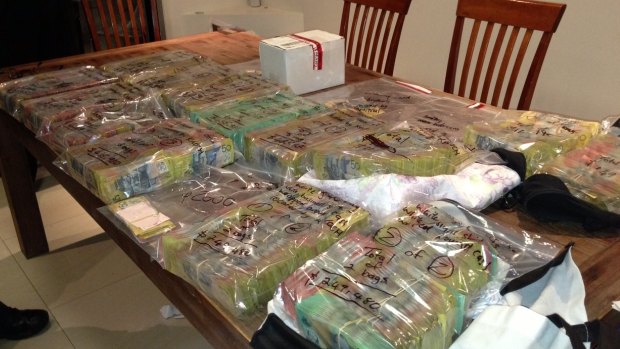More than $1 million in cash, suspected to be proceeds of crime, was seized in the raids.