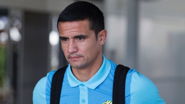 Ready to roll: Tim Cahill arrives at Sydney Airport ahead of the second leg.
