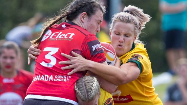 Renae Kunst of Australia has made a biting allegation against Janai Haupapa of Canada during this tackle on  Wednesday.