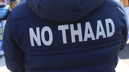 Protesters outside the Defence Ministry in Seoul.