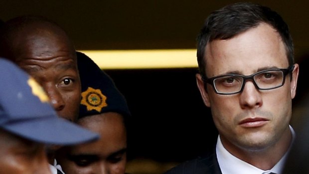 Oscar Pistorius leaves after listening to the closing arguments in his murder trial  in  August 2014. He was found guilty of culpable homicide.
