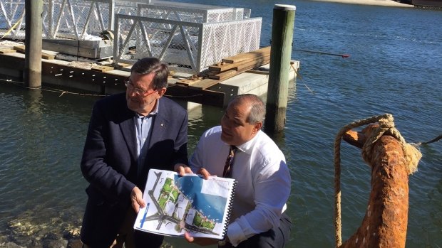 Waterways Board chairman Gary Baildon and Gold Coast mayor Ton Tate unveil the new river plan at Nerang River at Surfers Paradise.