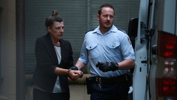 Fiona Barbieri is led from a corrective services van at the Supreme Court, in Sydney.