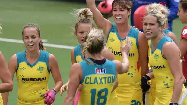 The Hockeyroos celebrate their win.