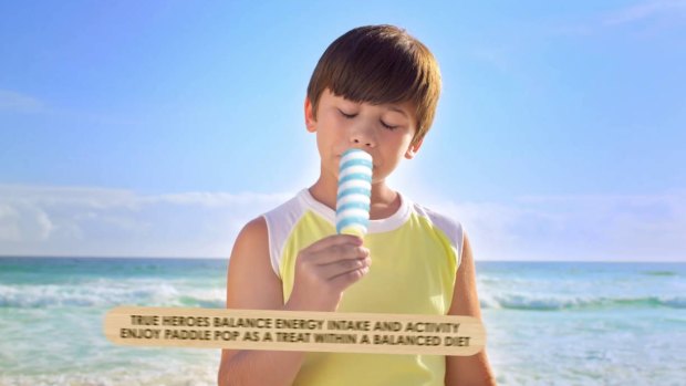 A still image from the video that displayed the message: "True heroes balance energy intake and activity enjoy Paddle Pop as a treat within a balanced diet." 