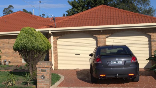 A car at the Seabrook home that is being inspected by forensic police.