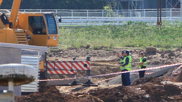 Police and Worksafe Queensland are investigating after two men were crushed to death by a falling concrete slab at Eagle Farm Racecourse.