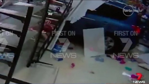 A car comes to rest inside Townsville IGA after hitting a teenager.