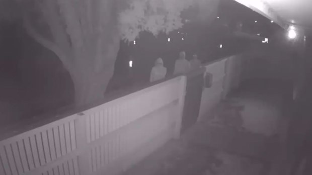 An image from CCTV footage showing three people police wish to speak to about the Dandenong North home invasion.