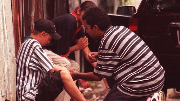 Heroin users on the footpath in Redfern in 1999.