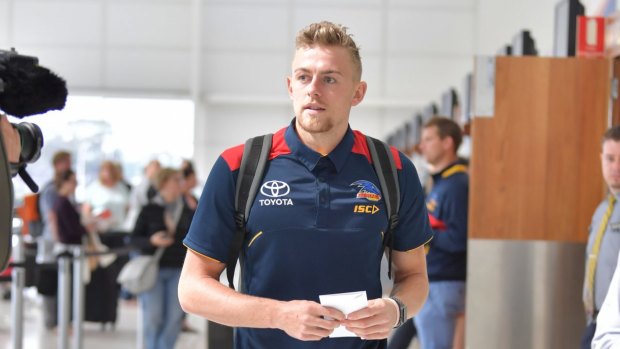 Hugh Greenwood on his way to catch a flight to Melbourne for the grand final.
