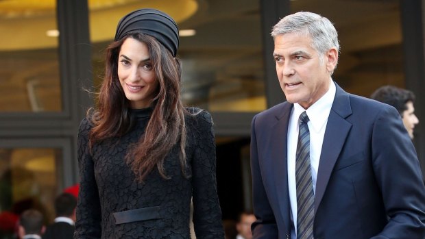 Amal Clooney and her husband George leave their meeting with the Pope in Vatican City last week.