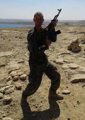 Robert Somerville in battle fatigues in Syria.