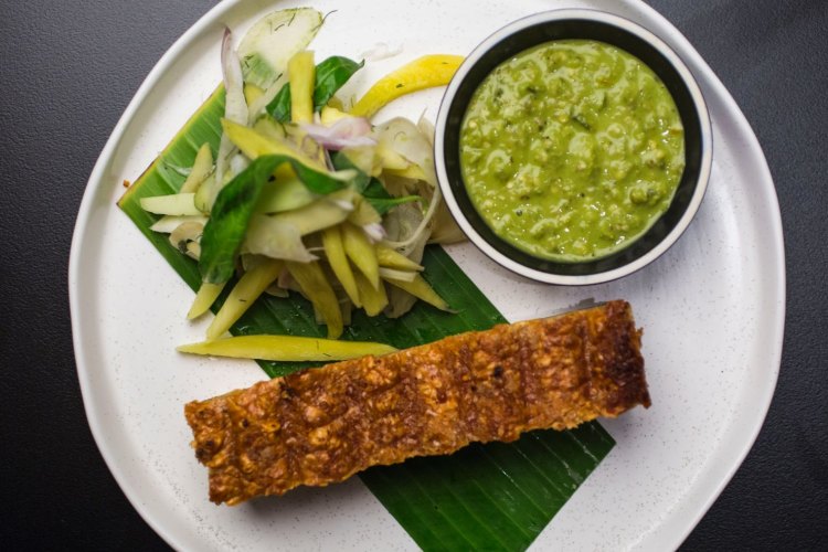 Rotisserie pork belly with fennel pickle and scud chilli death sauce served at Chin Chin in Sydney.