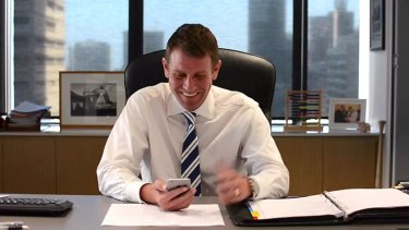 "That's actually quite clever": Mike Baird has a chuckle at one of the tweets in a still from the video.