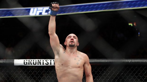G'day champ: Robert Whittaker is the first Australian fighter to claim a UFC title.