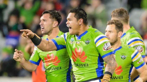 Canberra Raiders centre Joey Leilua roars after scoring a try against the Broncos. 