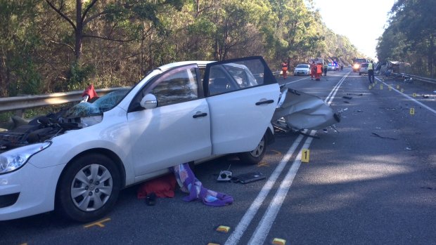 Two people died in this crash between a car and a truck on the Pacific Highway at Kundabung near Kempsey.  