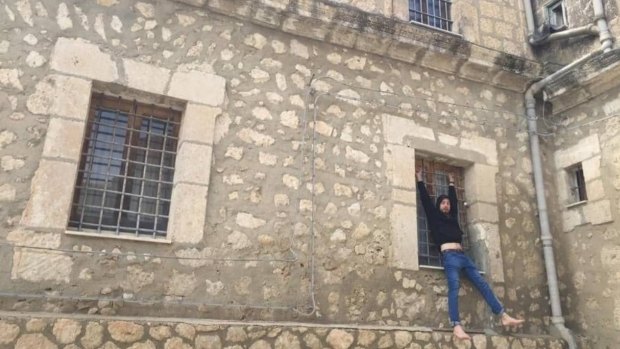 Kopun outside his three-story '€1 home' in Mussomeli.