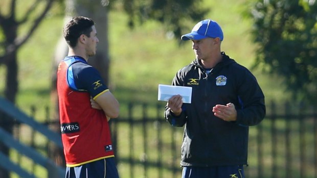 SYDNEY, AUSTRALIA - MAY 17: Mitch Moses of the Eels speaks to head coach Brad Arthur during a Parramatta Eels NRL training session at the Old Saleyards Reserve on May 17, 2017 in Sydney, Australia. (Photo by Jason McCawley/Getty Images)