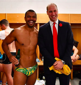 Smile: Kurtley Beale poses with Prince William after Australia's win over Wales at the weekend.