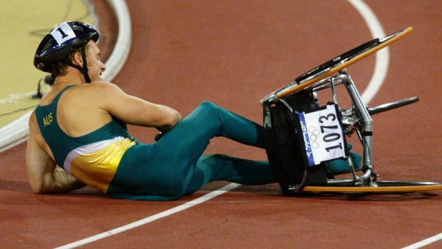 At the Sydney Olympics in 2000, John Maclean crashes out in the 1500m wheelchair final. 