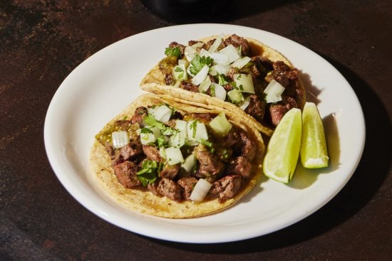 Tacos al pastor (marinated pork and pineapple) has made the move to Highett.