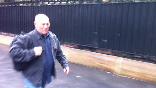 Angry Anderson leaves court during the bail application of Rose Tattoo drummer Paul DeMarco. 