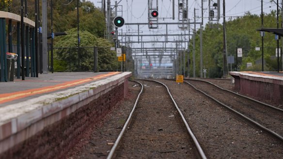 Woman saves boy on tracks from approaching train