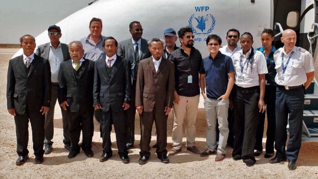 (Front row, from left) The four Thai fishermen after their release, before boarding a UN flight in Galkayo.