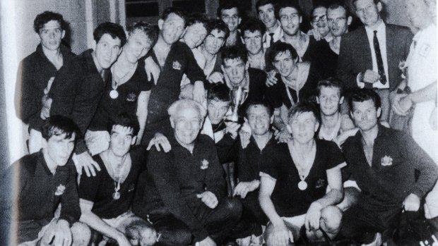Battle-weary heroes: The victorious Socceroos (including Johnny Warren, front row, second from left) after winning the Friendship tournament in Saigon, Vietnam, in 1967.