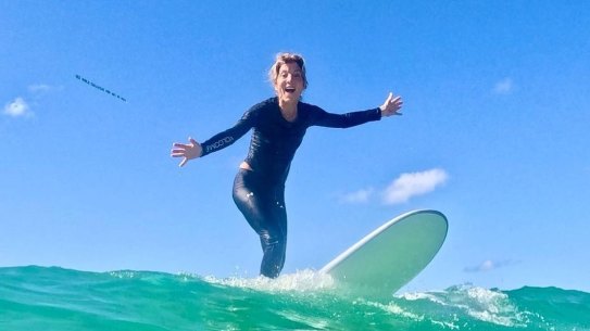 United States ambassador to Australia Caroline Kennedy gets a surf lesson. 