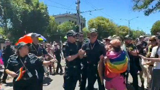 Protesters confront police last February.