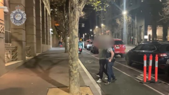 Avi Molla, an Aspendale Gardens builder seen here beiing arrested by the AFP, is  believed to be the leader of the syndicate.