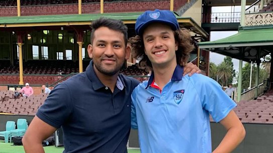 Sam Konstas (right) with Tahmid Islam.