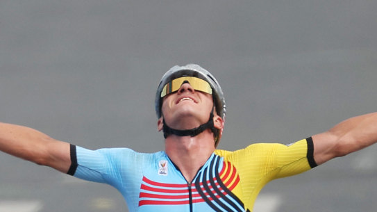 Remco Evenepoel celebrates his road race win.