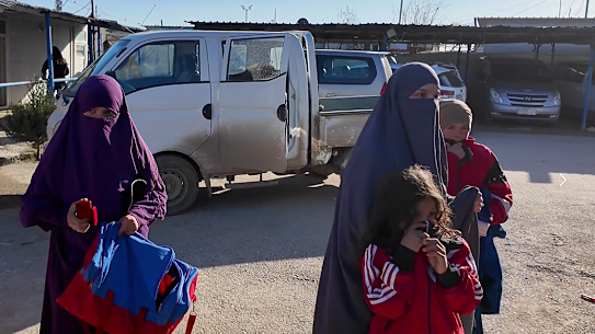 Australian families at the Al Roj refugee camp begin their journey home. 