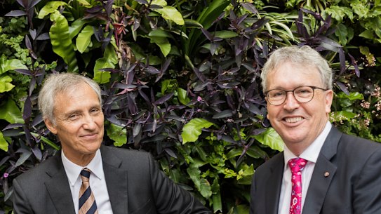 University of Wollongong Vice Chancellor Professor Paul Wellings (red tie) with Ramsay Centre CEO, Professor Simon Haines, after a deal signing on a university to the Ramsay Centre for Western Civilisation. 