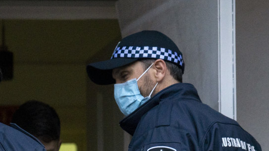 AFP conducting a raid on the home of a Sydney man charged with for allegedly attempting to misuse stolen Optus customer data in a text message blackmail scam.