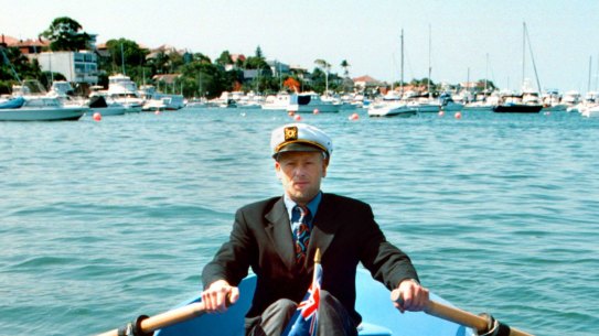 splash . 020111 AFR pic by Tanya Lake for CEO MAG FIRST USE CEO MAG Australia Day 2002 Edition. **DO NOT USE BEFORE THIS DAY!!!*** "redefining the Aussie Company" Pic shows a business suit CEO with Captains Hat falling off his row boat. generic Australian business going under company crash sink sinking up the creek fire redundant employee employment sack sacked retire retirement superannuation boss employer staff ***afrphotos.com***