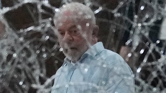 Brazilian President Luiz Inacio Lula da Silva inspects the damange at the Planalto Palace after it was stormed by supporters of his predecessor Jair Bolsonaro in Brasilia on January 8.